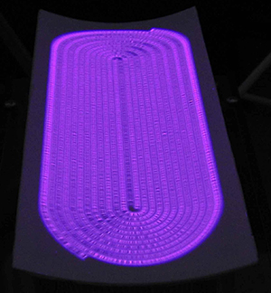 A new ‘diffuse coplanar surface barrier discharge’ (DCSBD) plasma source  (pictured) that rapidly cleans flat polymer sheets in open-air  conditions holds great promise for roll-to-roll manufacturing.