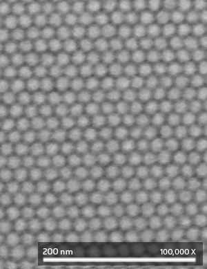 A scanning electron microscope image of a bit-patterned recording medium, with ordered arrays of magnetic islands.