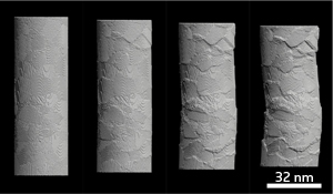 Simulated deformation of a platinum nanopillar under increasing levels of compression from left to right.