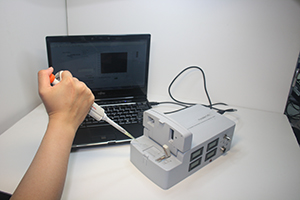 Analyses of liquid samples that once required a full-sized laboratory can now be completed on a disposable plastic chip equipped with narrow fluidic channels and tiny sensors.