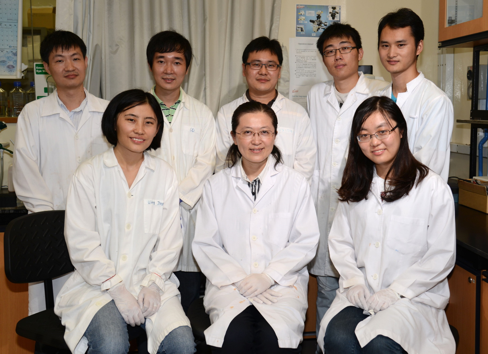 Professor Bin Liu (center front) with members of her research team.